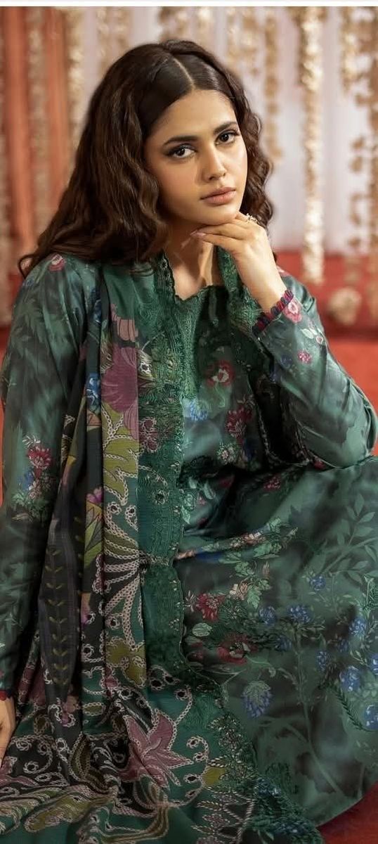 Model laughing with a marigold yellow dupatta flowing in the wind